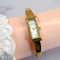 Gucci 1500L bangle watch Women's Pearl white/Gold Watch