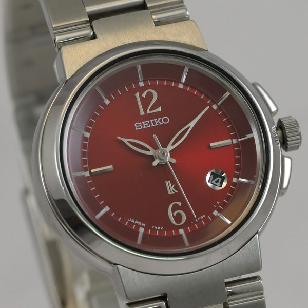 Seiko Lukia women Round Shape watch 28mm Red Tone Dial quartz Ref.7N82-6E00